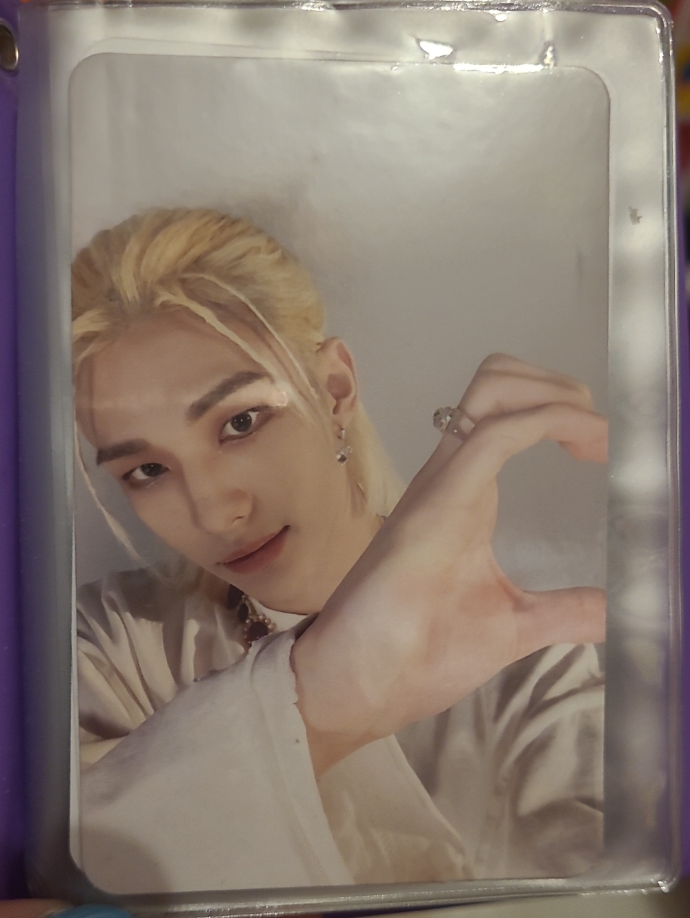 This is an official photocard of Hyunjin from the Stray Kids MAXIDENT album.